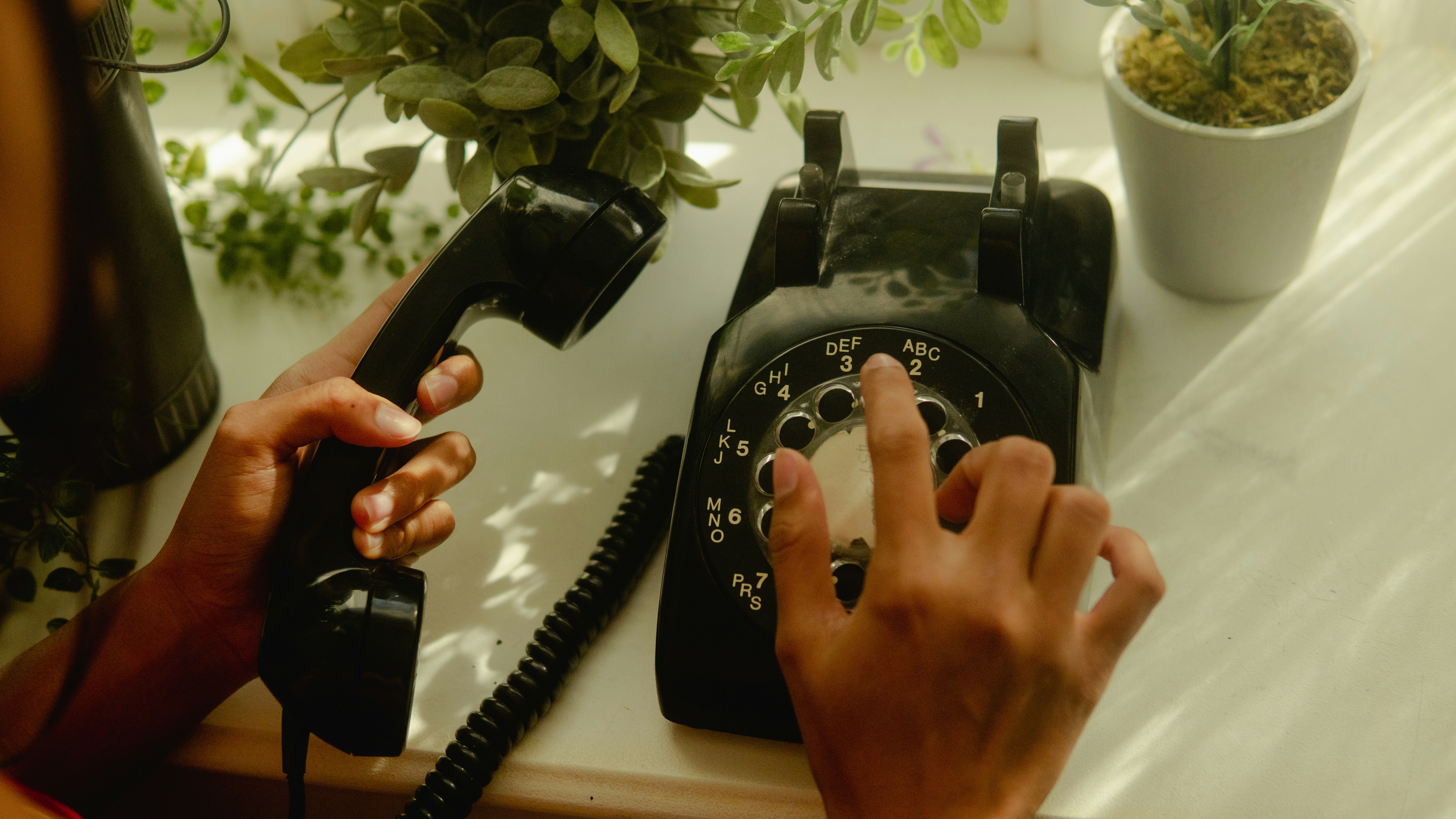 Person using a helpline phone