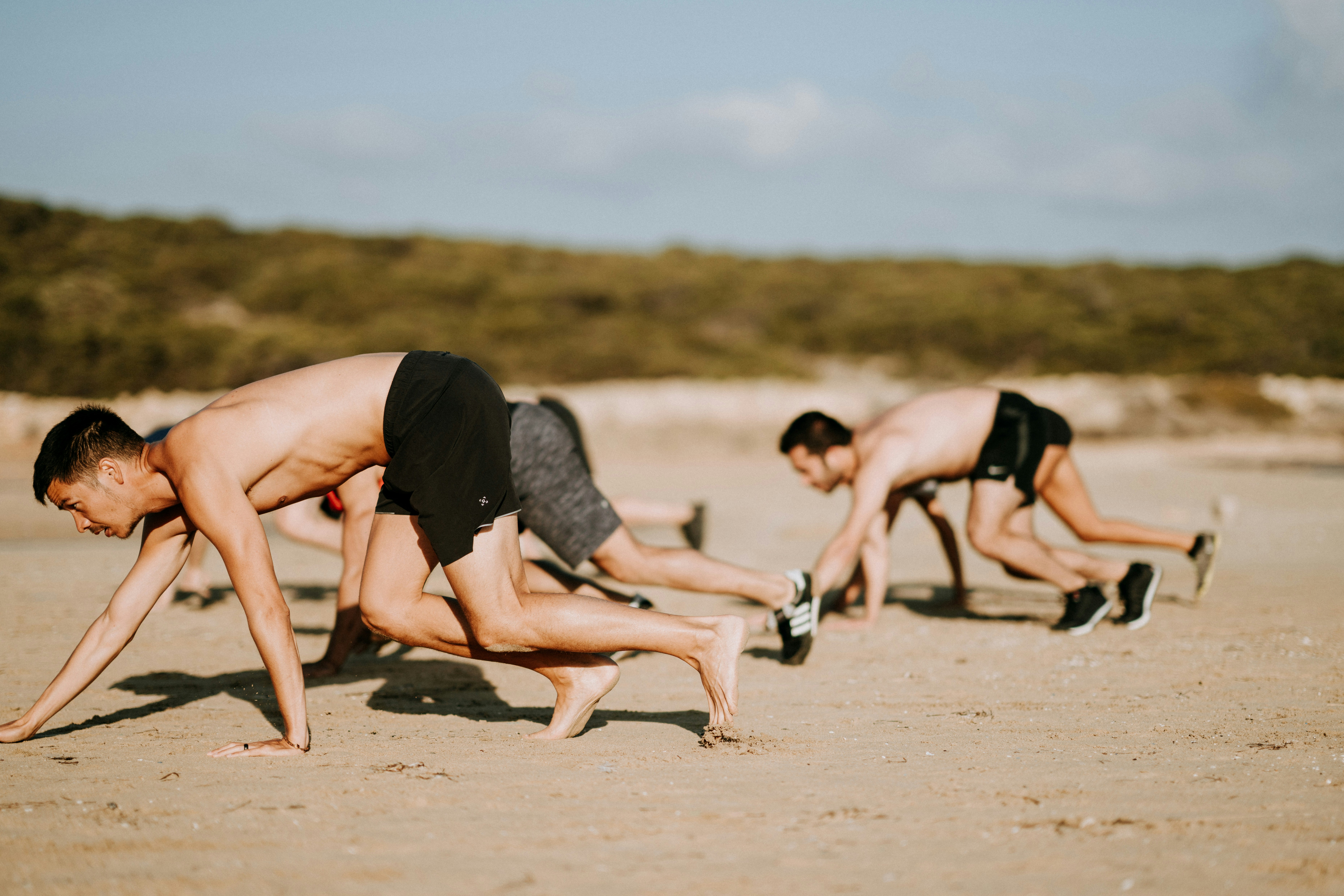 Men exercising together in the community