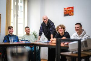 A group of young men attending a mentoring session.