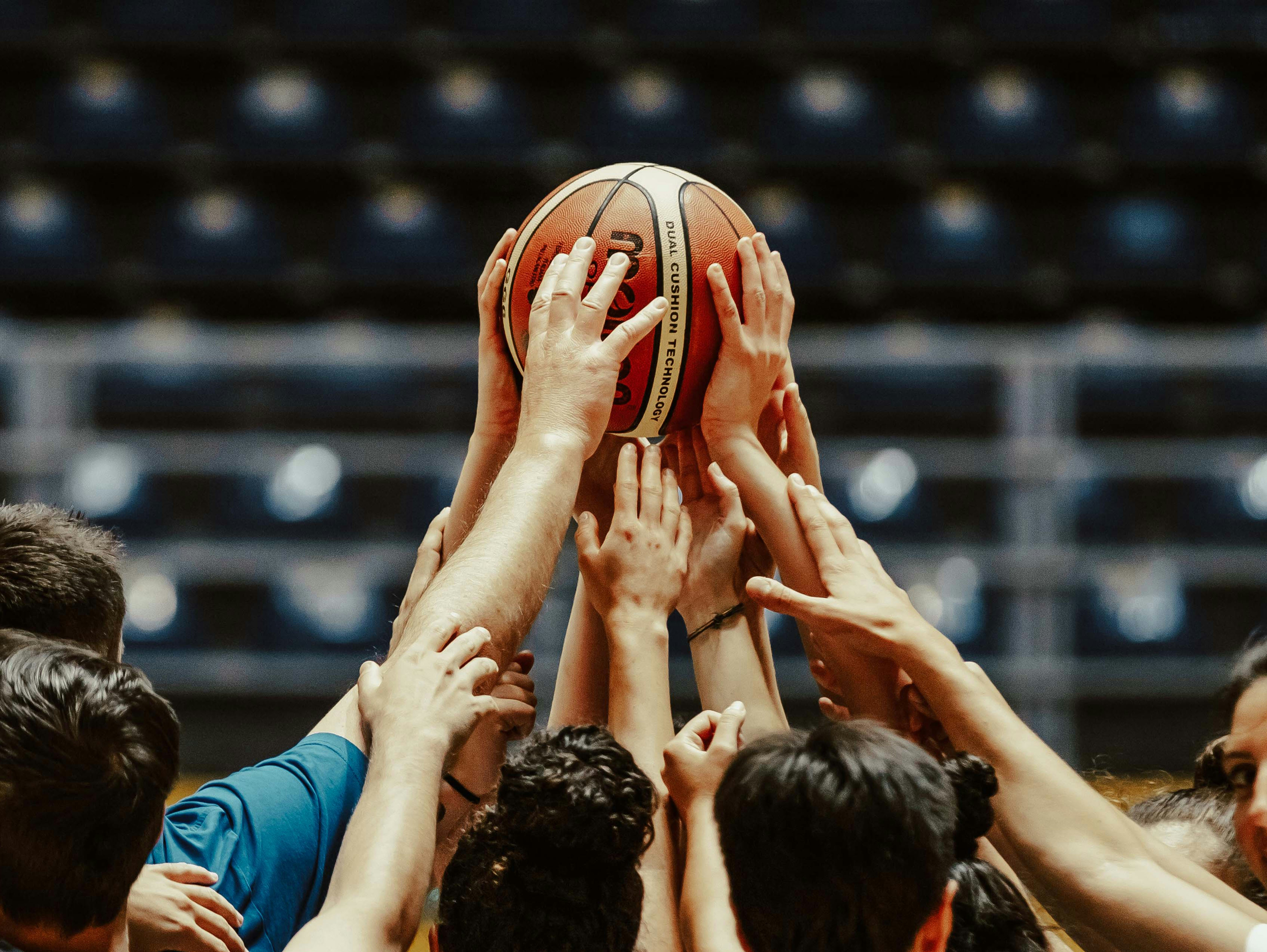 Young people playing basketball